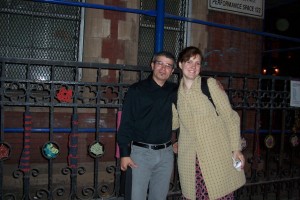 Pianist Louis Menendez and Gretchen outside by the fence, after the performance